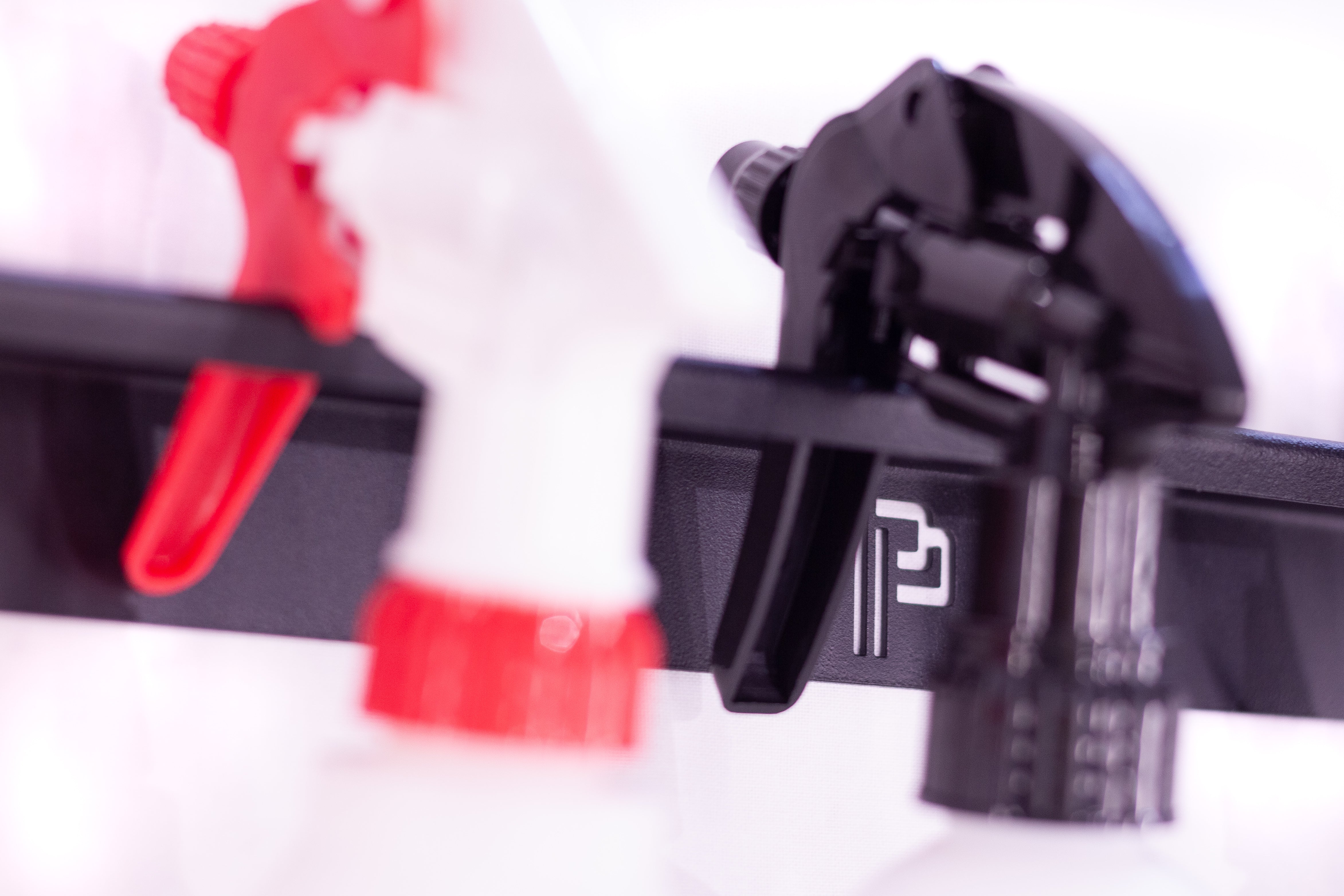 Holder for Bottles and Sprayers
